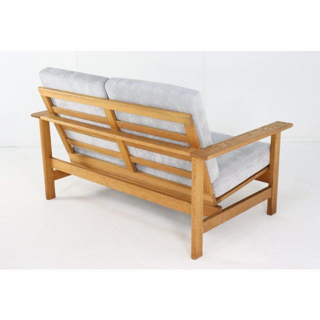 Completely restored sofa, model 2452, designed by Søren Holst for Frederica Stolefabrik. This Danish sofa is made of...