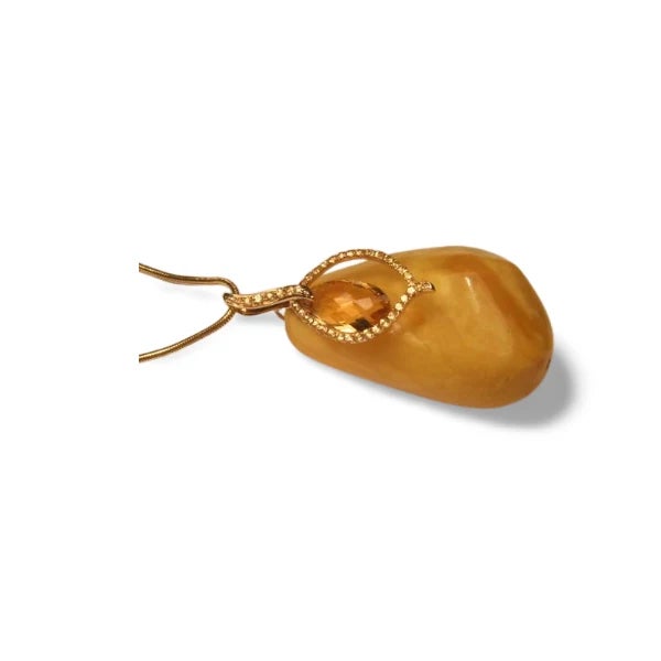 Stunning 14K yellow gold pendant necklace featuring natural amber, pear-cut citrine, yellow citrines, and champagne...