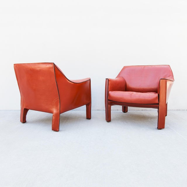 A rare pair of postmodern CAB 415 lounge chairs by Mario Bellini, made in Italy by Cassina c. 1990s. Upholstered in a...