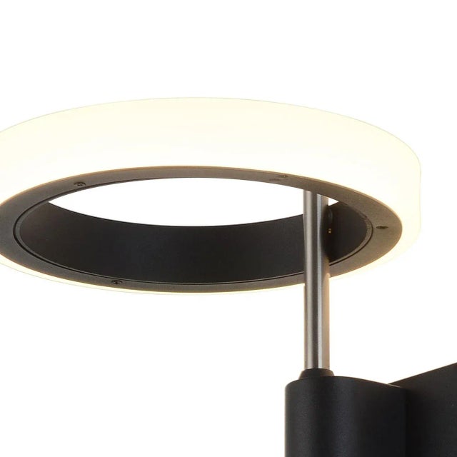 Enhance your living space with the stylish and energy-efficient Aerial LED wall sconce, a striking choice for mid-century...