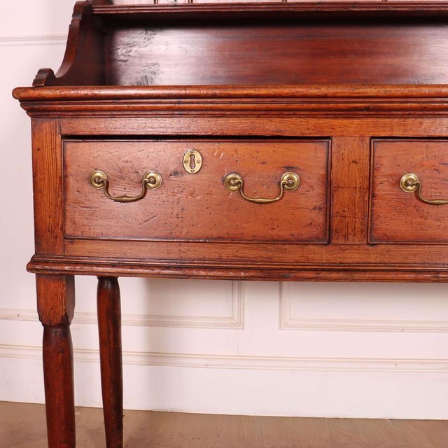 Good late 18th C English pine dresser. Very good colour and original brass handles. 1780 Height to worktop- 89cm, Rack...