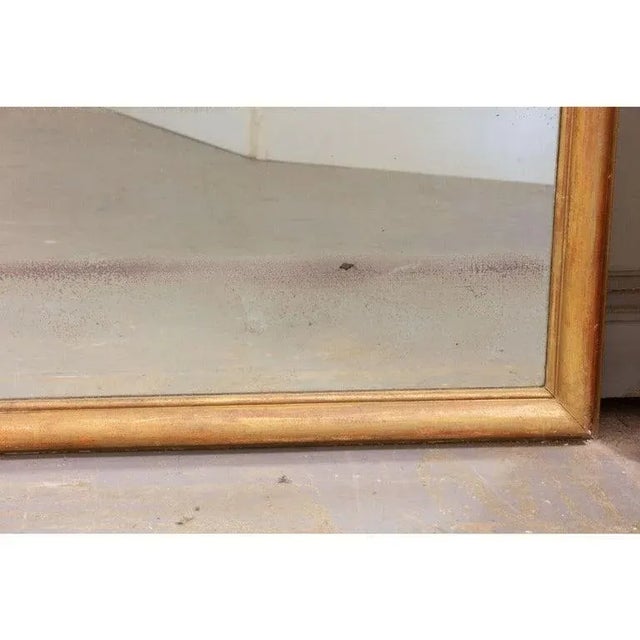 This French 19th century mirror from the main hall of the Archbishop Palace Rouen, France is monumental in scale. The...