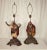 A rare pair of antique lamps in the figures of a Moroccan male playing a stringed instrument and a Moroccan female...