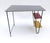 Extremely rare small desk designed and executed around 1955 by the son of Gerrit Th. Rietveld. The writing table is in an...