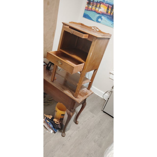 Provenance & Quality Offered is a stunning, authentic breakfront bookcase handcrafted by the renowned Kindel Furniture...