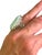 This stunning ring features an oversized Larimar gemstone in a teardrop shape. The ring is sterling silver with gold...