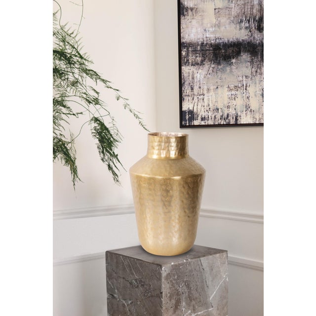 The Espen collection features a hammered textured finish in both matte gold and bright silver. Each piece is crafted by...