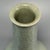 Fine antique Chinese celadon long‑neck vase. Slender elegant neck rising from rounded bulbous body, covered in natural...