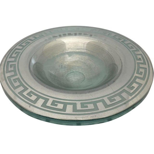 The Stephen Schlanser 16'' Diameter Art Silver Glass Bowl Centerpiece is a stunning piece of mid-century modern decor....