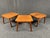 Set of (3) MCM end tables in teak. Featuring all wood construction and sculpted legs. Perfect addition to any area in need...