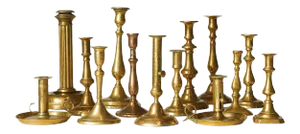 A Collection of sixteen brass candle sticks, various sizes and shapes.