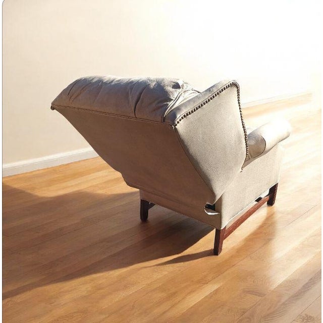 Premium Upholstery: This exquisite recliner features genuine full-grain leather where it matters most, providing a...