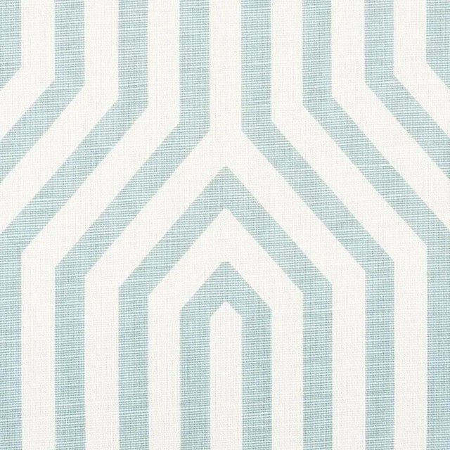 We introduced this large-scale, ziggurat design as a luxe cut velvet. Now, we've translated it into a fun, graphic print...