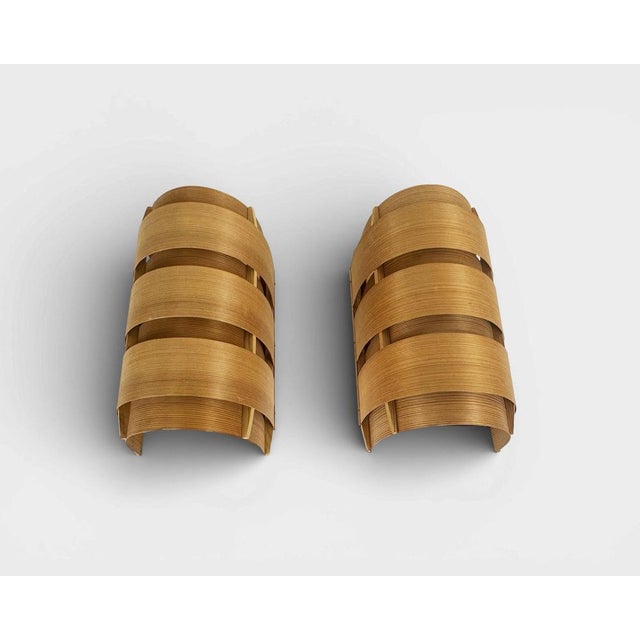 Beautiful pair of V155 wall lamps designed by Hans-Agne Jakobsson and produced in Sweden in the 1960s. Made from curved...