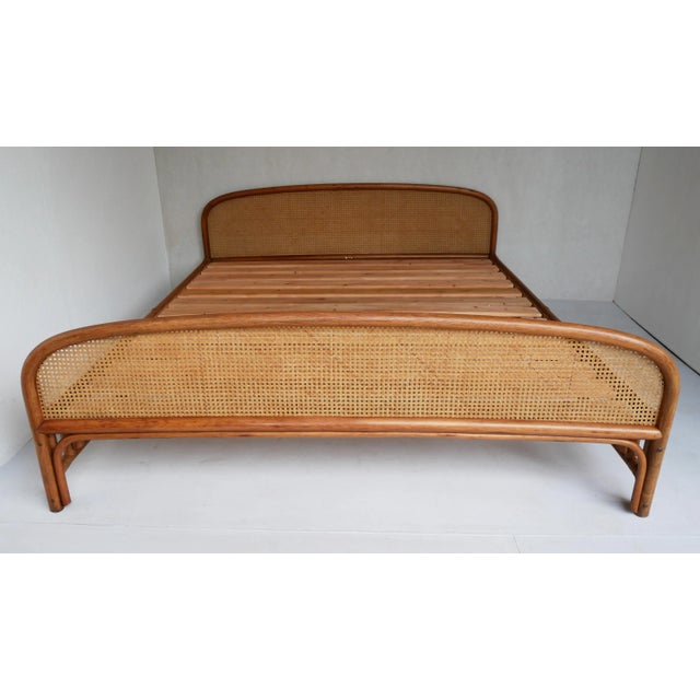 Double bed with rattan and cane frame, fully dismountable, with pine slatted base. Made by Gervasoni Udine, Italy, 1970s I...