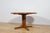 Round extendable table made of teak wood, produced in Denmark in the 1960s. The table has contoured, solid edges. The...