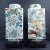 A matched pair of Chinese porcelain garden butterflies cong vases, with white glazed exteriors, interiors and inset bases....