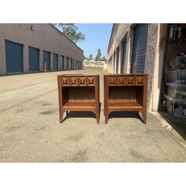Stunning solid walnut mid century night stands. The pieces has 1 drawer and open space below. . The modern mid century...