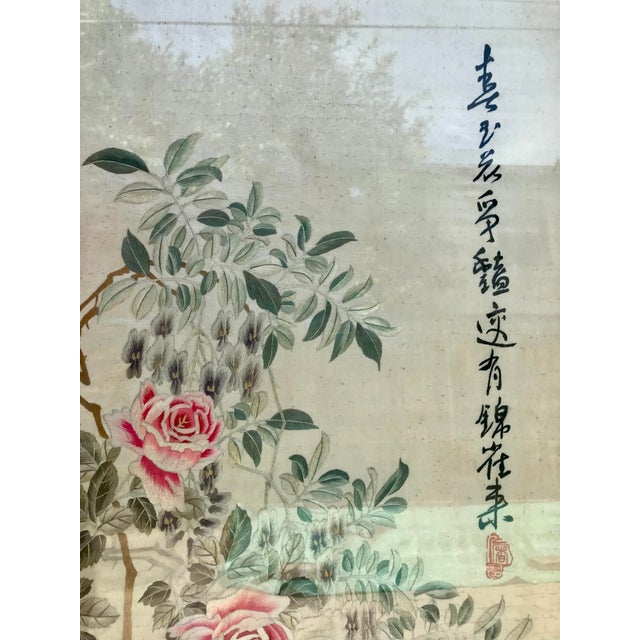 Pair of Beautiful Vintage Chinese Silk Embroidery of Birds with Flowers Framed on Deep Red Painted Bamboo. These signed...