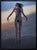 This artwork depicts a figure suspended in mid-air, surrounded by a dreamlike sky that transitions from warm hues to...