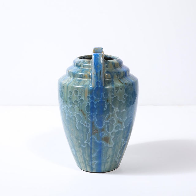 This exquisite Art Deco ceramic vase is a prime example of the iconic Skyscraper style, showcasing the geometric elegance...
