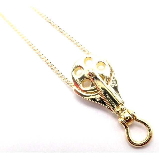 Vintage Tiffany & Co. Ralph Lauren Yellow Gold Pulley Pendant Necklace For Sale - Image 13 of 14