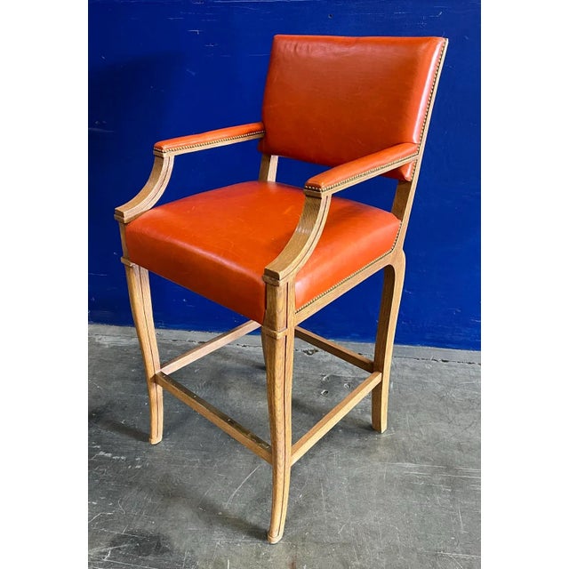 Wire Brushed Finish on Rift Oak. Satin Brass Footrest. Upholstered in Jerry Pair Leather #3016-01 Greener Pastures – Fox....