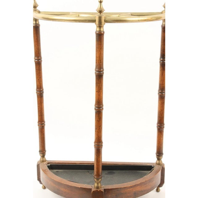 Early 20th century English brass and faux bamboo umbrella stand or walking stick stand with five divisions, three...