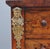 A fabulous quality 19th walnut and marquetry Wellington chest, the shaped and moulded cornice decorated with floral...