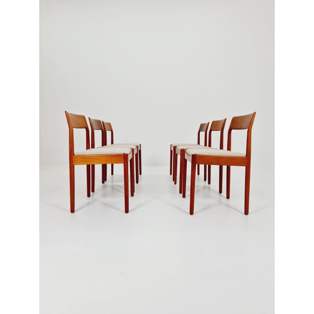 Danish teak dining chairs by Johannes Norgaard, 1960s, set of 6. The chair frames are made from solid teak and are in...