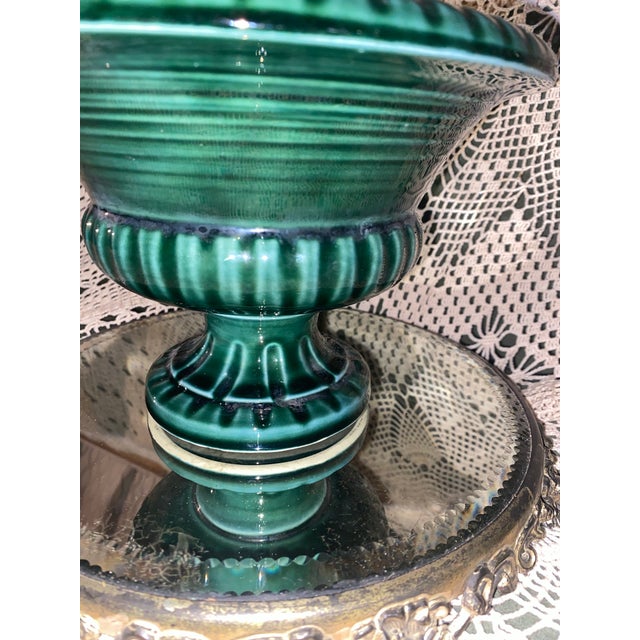 Hull Pottery was an American pottery company founded in Crooksville, Ohio, in 1905. It became known for its decorative art...