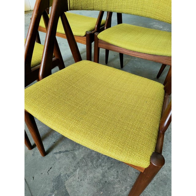 Model 31 chair designed by Kai Kristiansen for the Danish firm Schou Andersen Møbelfabrik. Manufactured in Afrormosia...