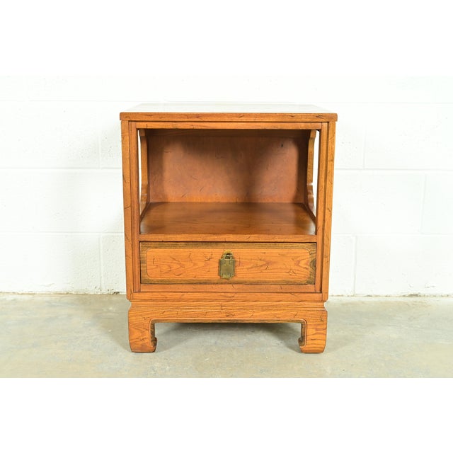 A beautiful mid-century modern Hollywood Regency Chinoiserie nightstand or end table By Davis Cabinet Co. USA, Circa 1960s...