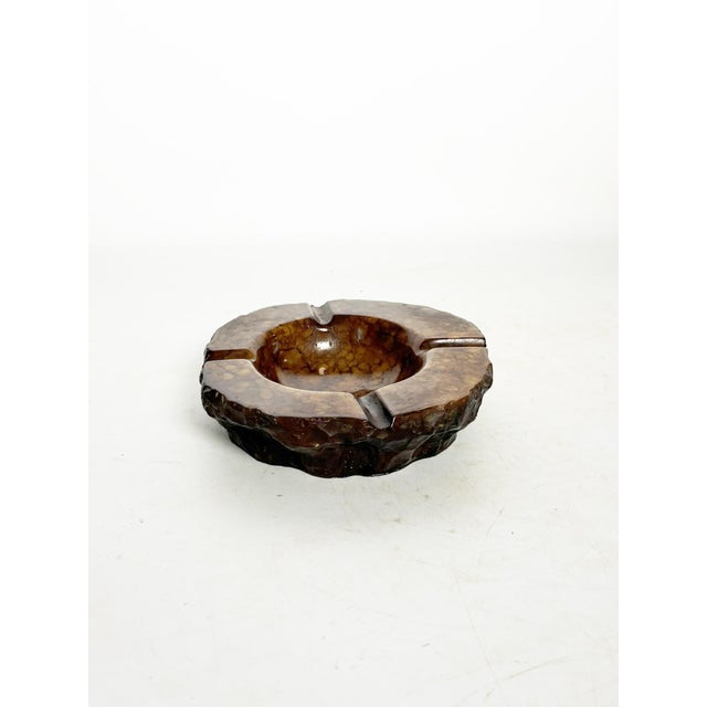 Ceramic ashtray, France, 1950s, with an organic and authentic design. This piece is distinguished by its irregular, rock-...