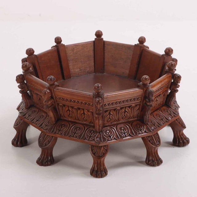 Each of the figures is uniquely carved on this 10-sided (practically round) elevated platform cat or dog bed. Simply drop-...