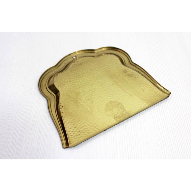 Brass dustpan and table brush 1960 The design has been well thought out for this small, practical and decorative object....