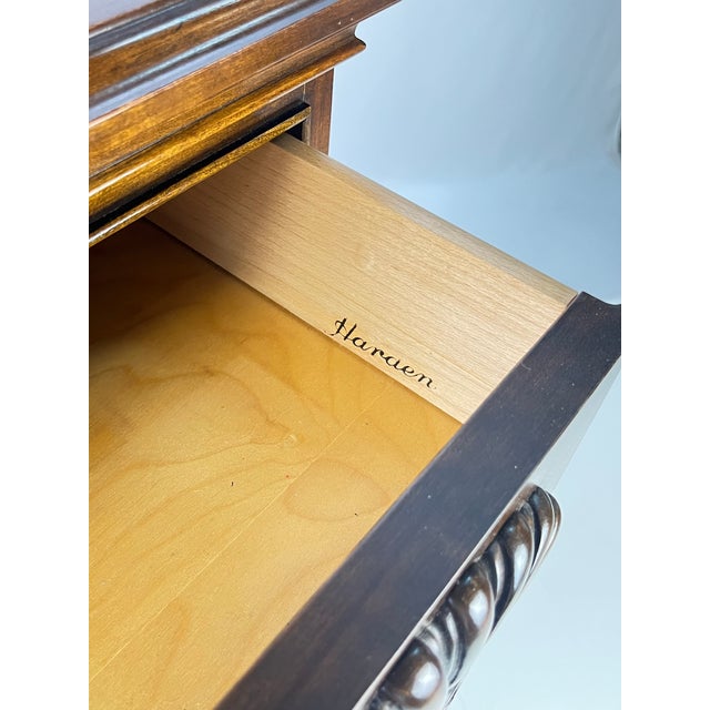 Solid cherry block front shell carved bachelor's chest of drawers in the classic Chippendale taste by Harden Furniture....