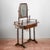 This refined dressing table with mirror represents a classic example of period furniture, characterized by a simple and...