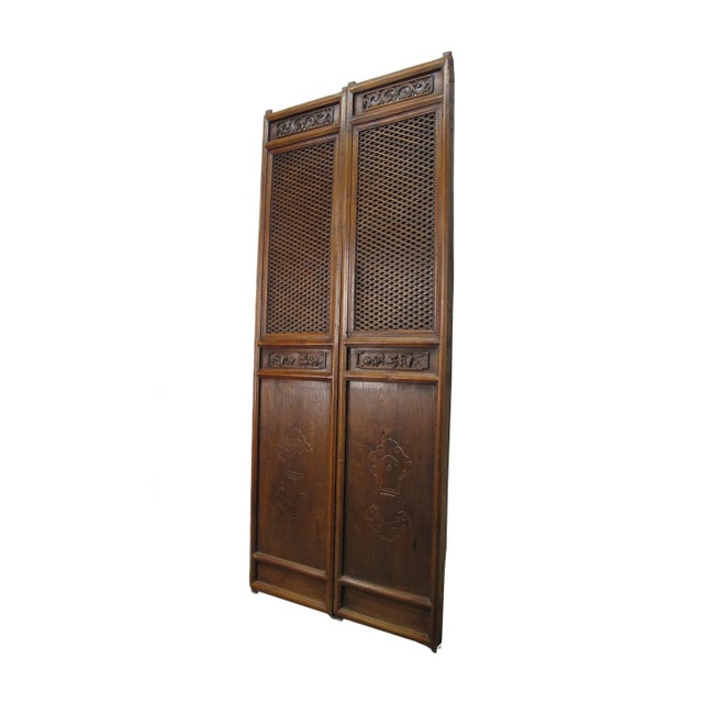 This pair antique Chinese screen door panels showcase hand made intricately designed lattice patterns. Each lattice panel...