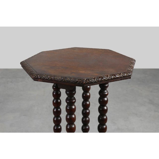 France / 1850 / Side Table / oak / Rustic / Baroque / Antique A captivating embodiment of mid-19th century French...
