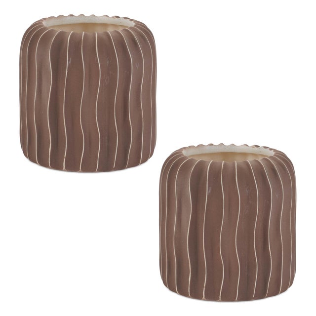 Bring a natural touch to your home decor with the Wavy Ribbed Ceramic Vase set. Featuring earthy brown and beige tones...