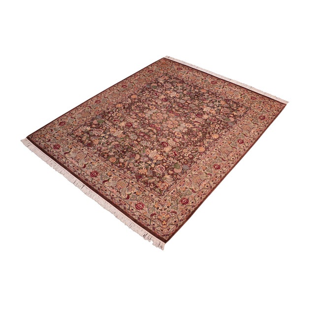 Designed with mesmerizing intricacy and gorgeous color palette, this hand-knotted masterpiece demonstrates the beauty and...
