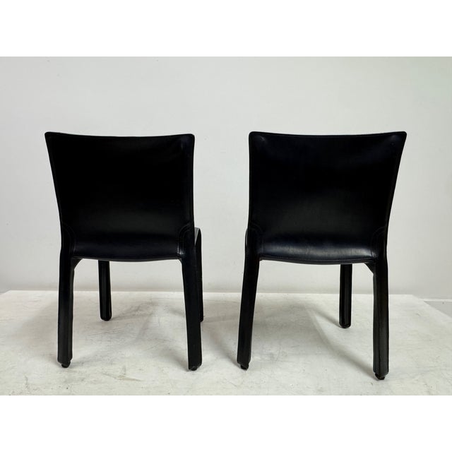 A set of six ‘Cab’ 412 dining chairs designed by Mario Bellini for Cassina, first introduced in 1977. The design is...