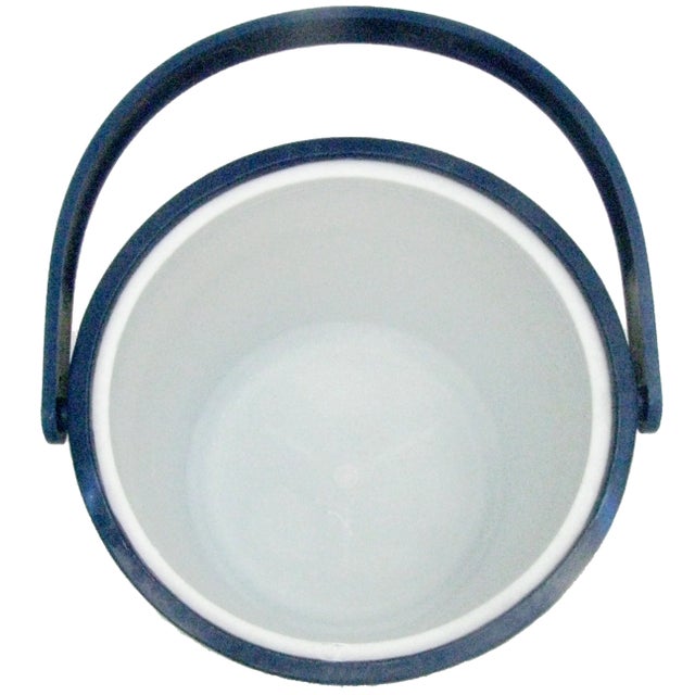 Mid-century modern patent leather look blue vinyl ice bucket with clear acrylic lid. A colorful addition to any bar....