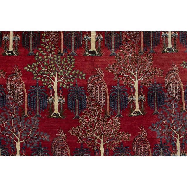 Beautiful Traditional Persian Tabriz oversize rug from the second quarter of the 20th century. In reds and blue with an...