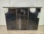An elegant and rare Pierre Cardin sideboard from the 1970s, featuring a sophisticated and dramatic design, typical of the...