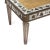 A refined painted and églomisé low cocktail table in the style of Maison Jansen, late 20th century. The rectangular form...