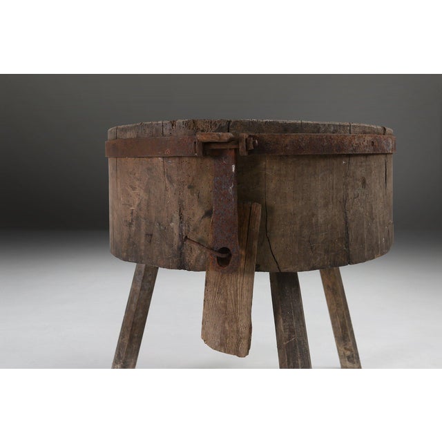 A wonderfully authentic piece of early 20th‑century rural craftsmanship, this French chopping block table from the 1920s...