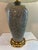 Beautiful oriental celadon crackle table lamp with brass base. Circa Late 20th Century.
