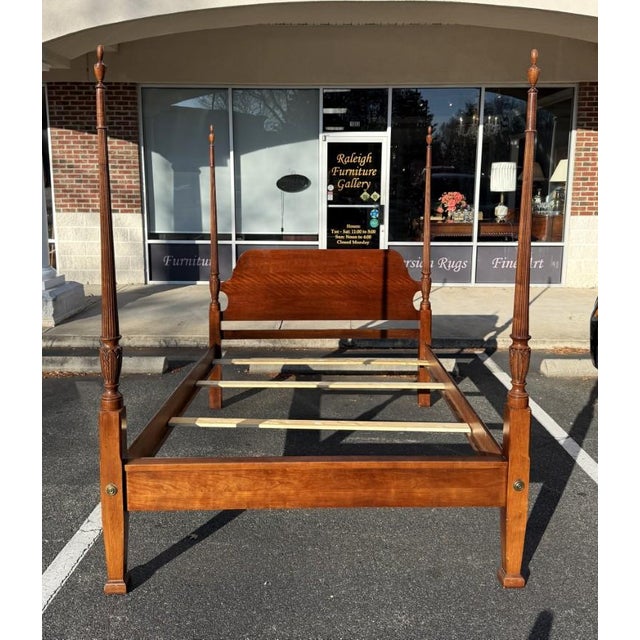 This vintage solid cherry queen size poster bed features tall, turned posts and a beautifully shaped headboard with rich...